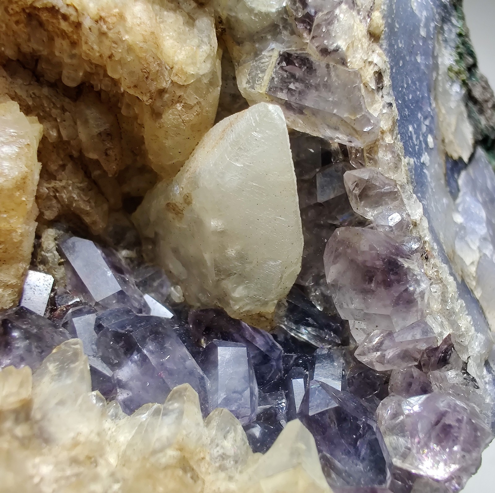 Excellent Amethyst and Calcite crystal Agate Geode, Fluorescent. 312 grams.