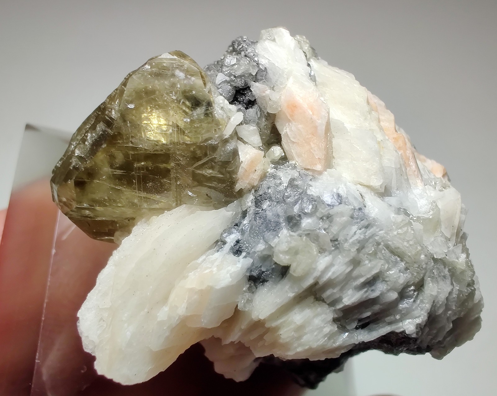 Excellent Cerussite crystal with Barite on Galena, UV. Morocco. 42 grams.