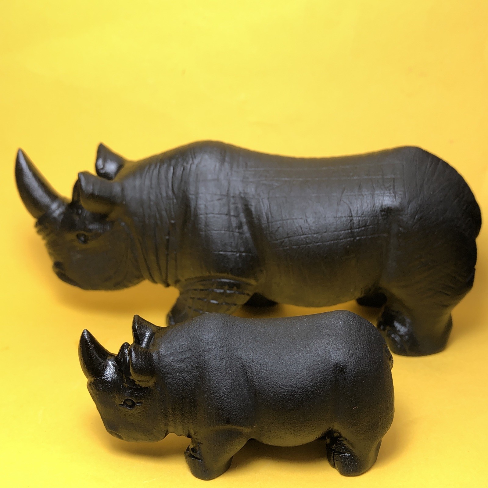Top natural obsidian crystal quartz mineral label hand-carved rhinoceros family.