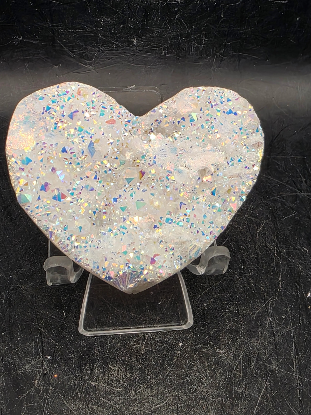 White pearl aura quartz heart! 3.4 ounces, 2.5 inches wide, 2.1″ tall
