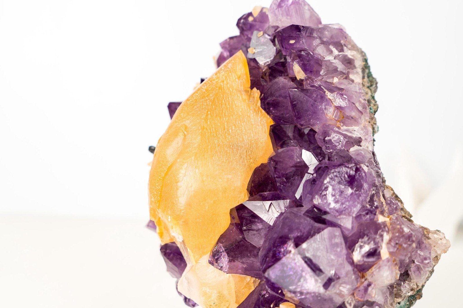 Rare Golden Yellow Calcite Specimen on Deep Purple Amethyst Cluster
