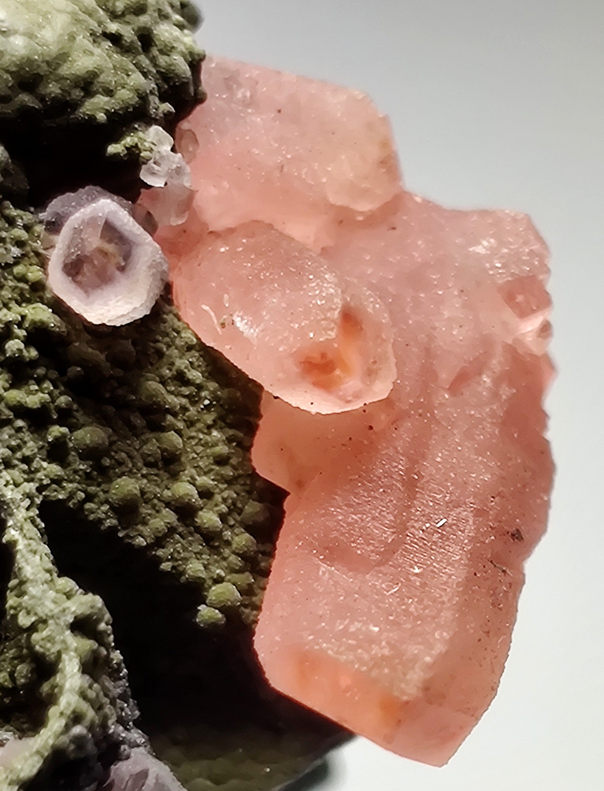 Rhodochrosite crystals on matrix. Uchucchacua Mine, Lima, peru. 14 grams.