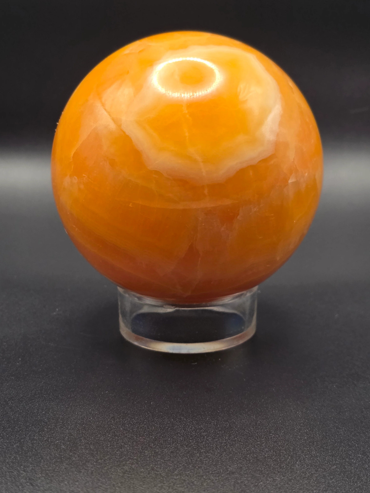 Large orange calcite sphere! 82.6mm, 3.2 inches, 1.12 pounds