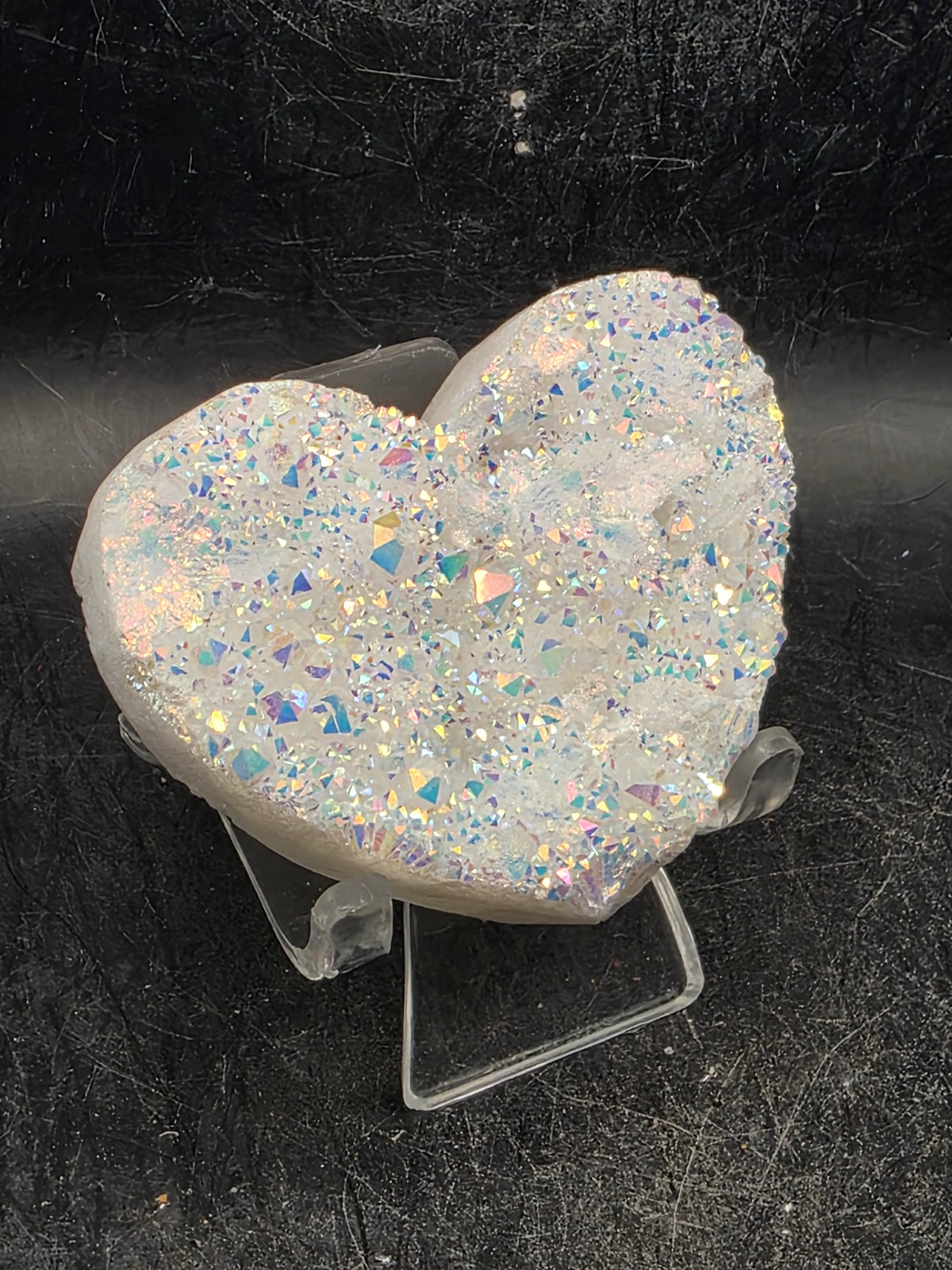 White pearl aura quartz heart! 3.4 ounces, 2.5 inches wide, 2.1″ tall