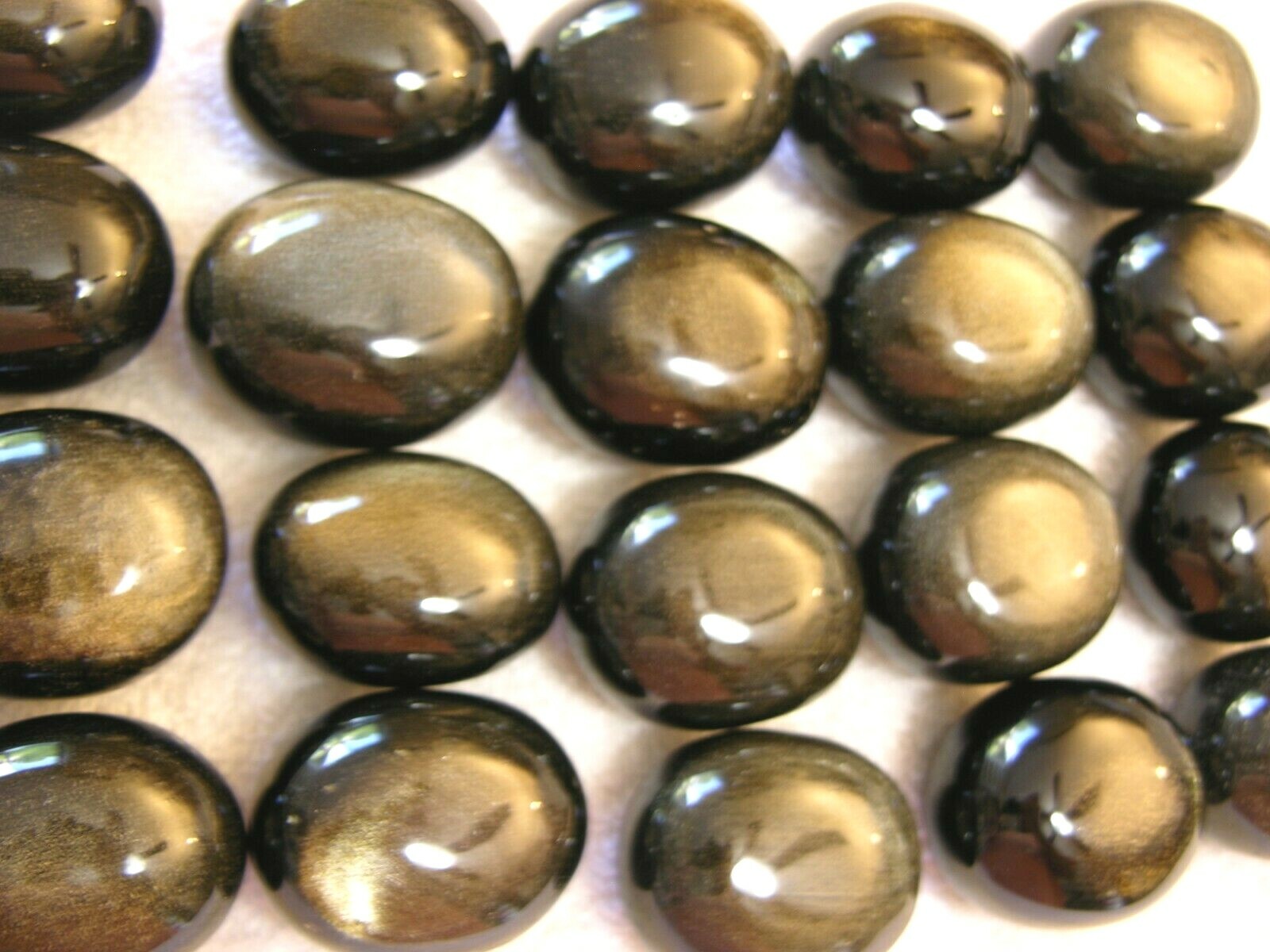 Golden silver sheen obsidian palm stone gem grade 1.5×1 inch 1 stone per winner