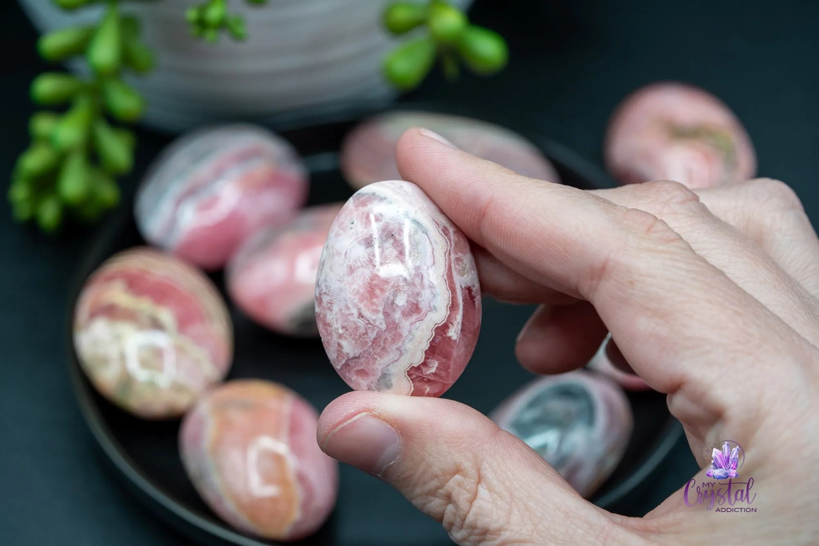 Rhodochrosite Palm Stone – Puffy