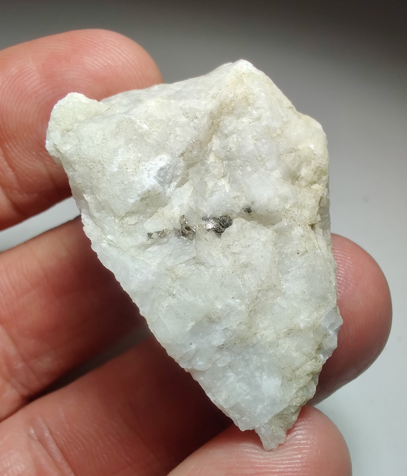 Hackmanite in Nepheline, fluorescent. Bancroft, Ontario, Canada. 26 grams.