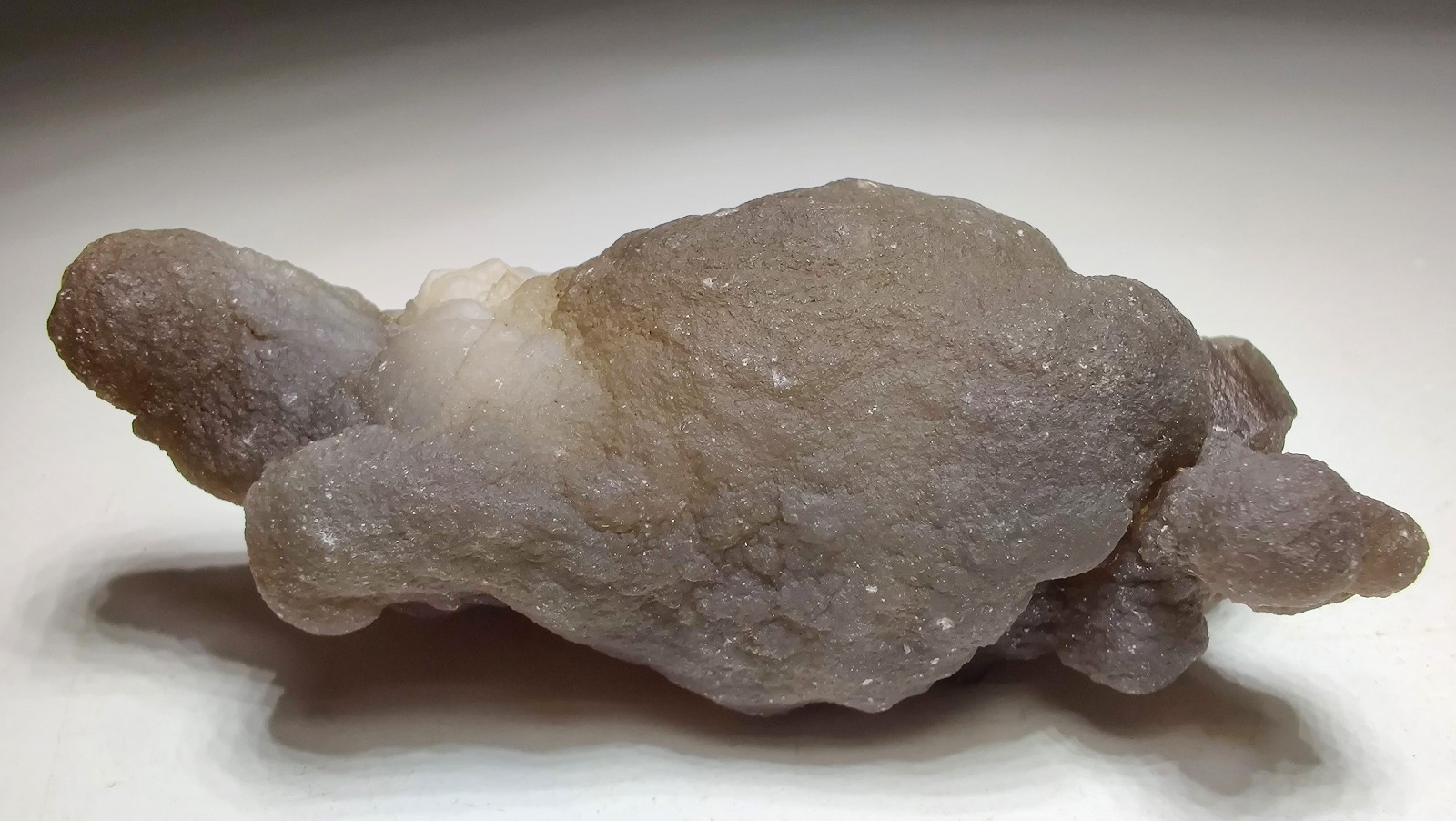 Chalcedony nodule, fluorescent orange. Morocco. 60 grams.