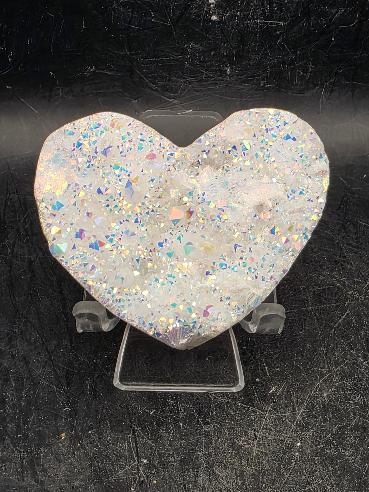 White pearl aura quartz heart! 3.4 ounces, 2.5 inches wide, 2.1″ tall