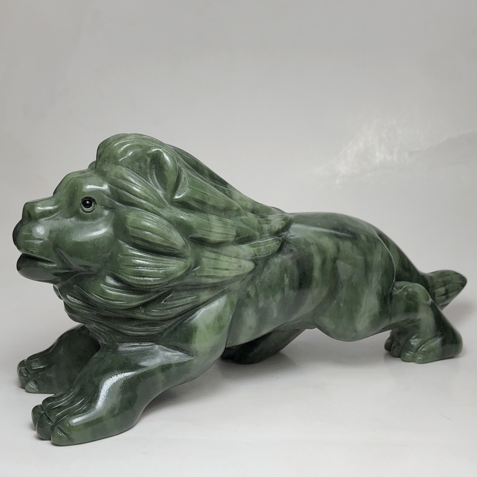 Lion hand-carved natural Dushan jade crystal quartz mineral specimen collection.