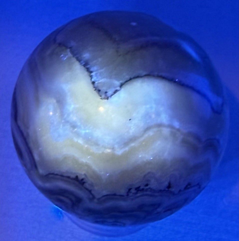 248g Zebra Calcite Crystal Sphere Funny Face UV With Holder