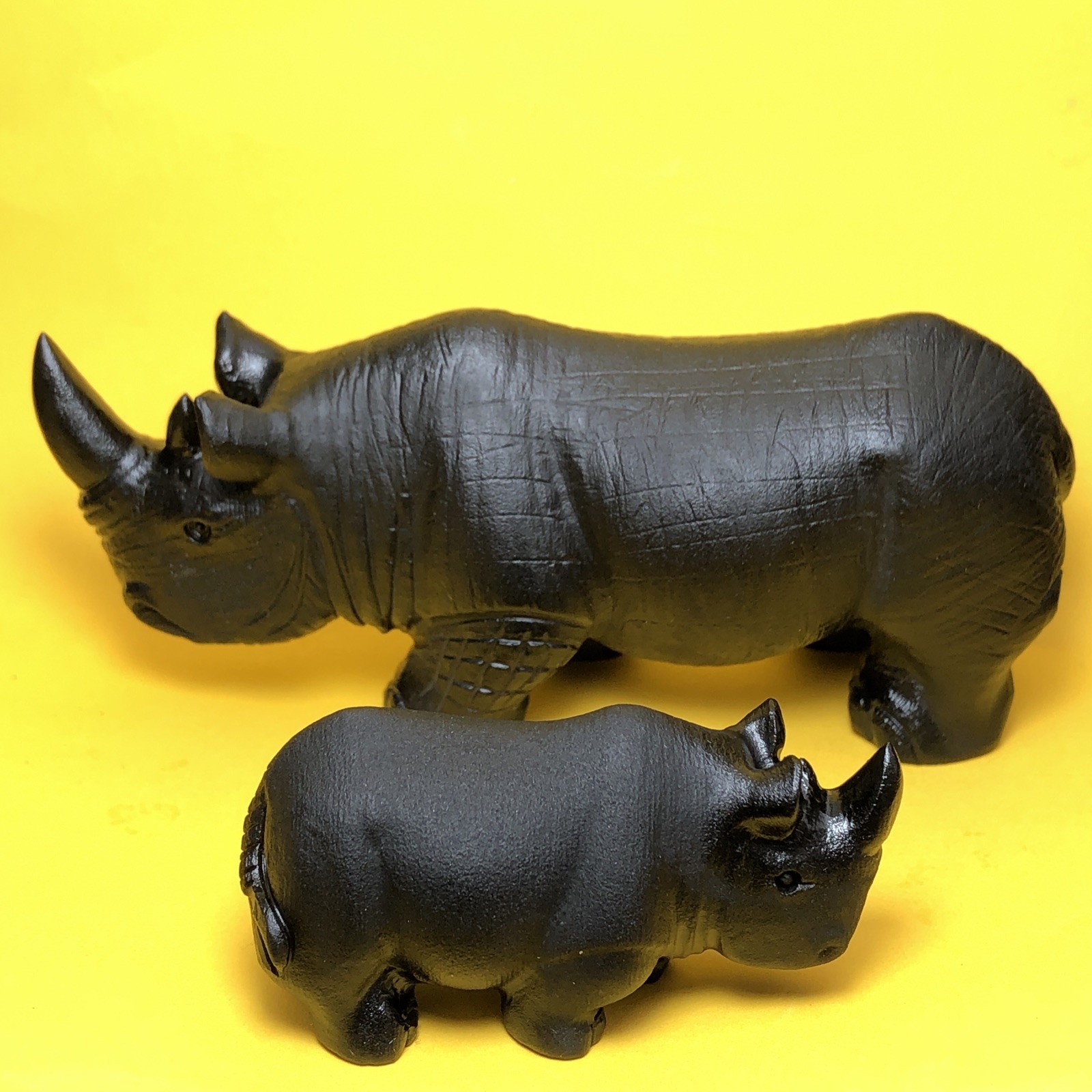 Top natural obsidian crystal quartz mineral label hand-carved rhinoceros family.
