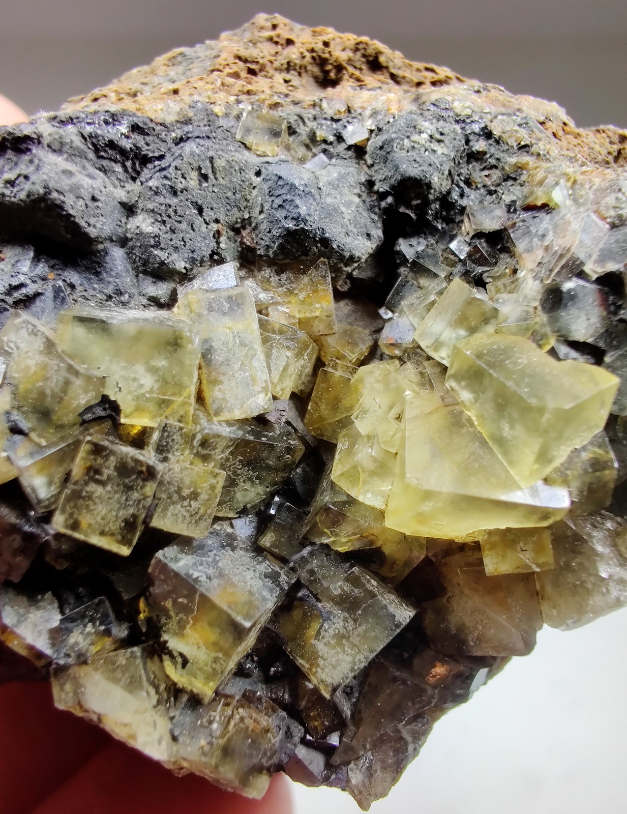 Fluorite crystals with Tar smell!. Illinois-Kentucky Fluorspar Dist. 118 grams.