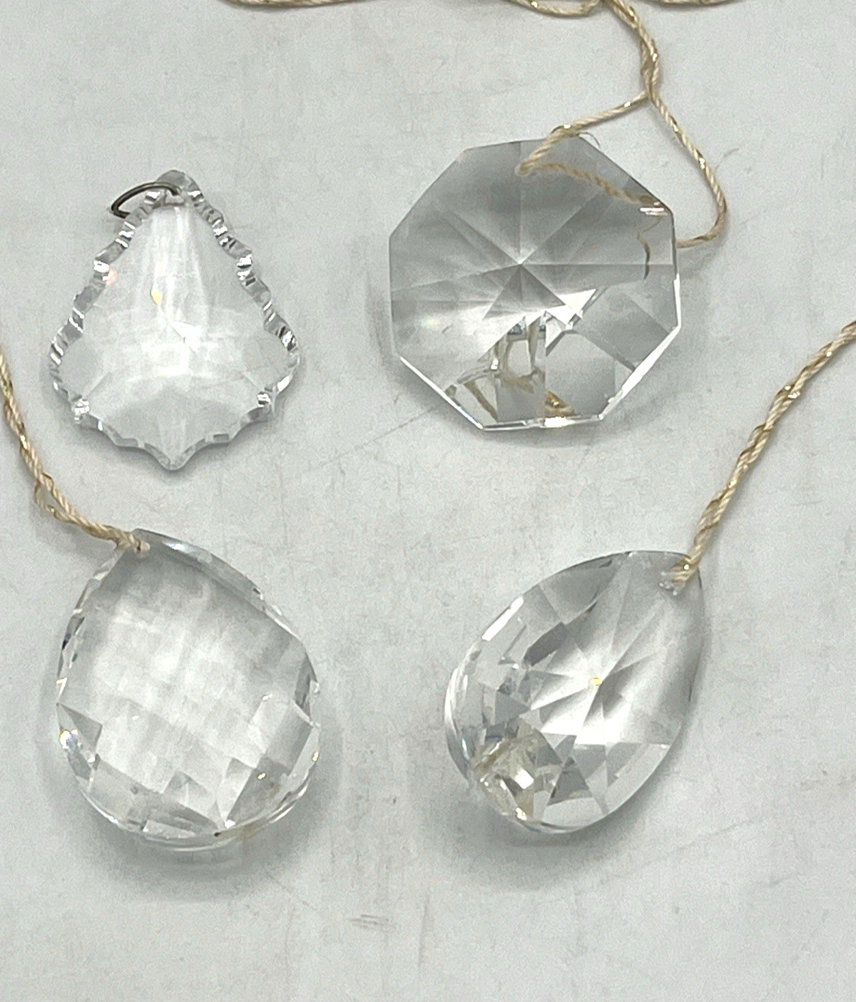 4 Swarovski Spectra Crystals 2 Different Cut Teardrops 1 Octagon 1 Pendalogue