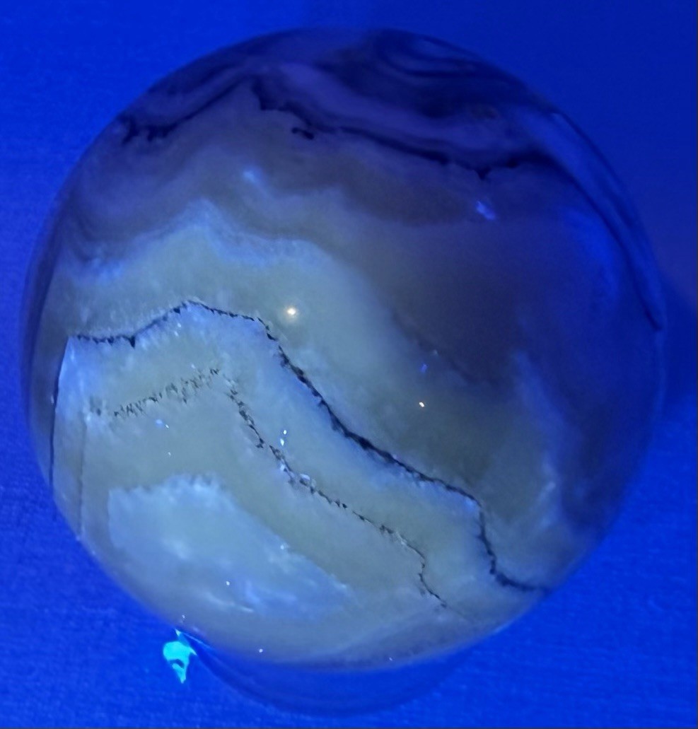 248g Zebra Calcite Crystal Sphere Funny Face UV With Holder