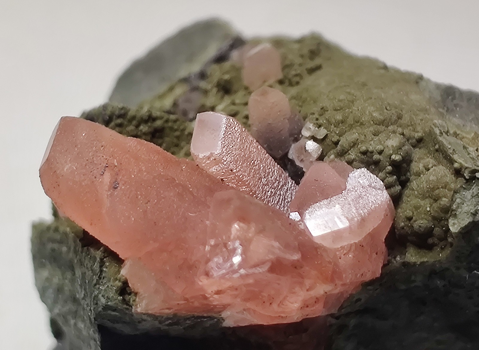 Rhodochrosite crystals on matrix. Uchucchacua Mine, Lima, peru. 14 grams.