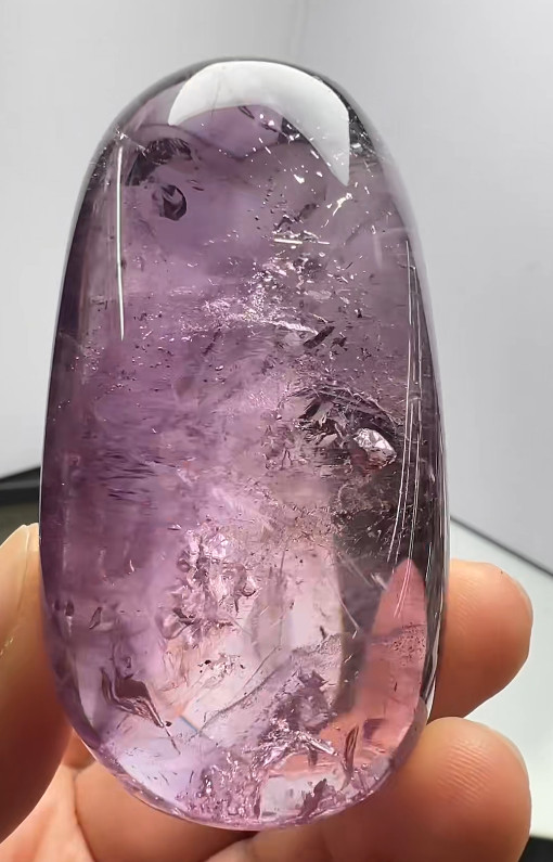67*36*30mm Natural Amethyst Quartz Moving Water Drop Specimens Palm Reiki