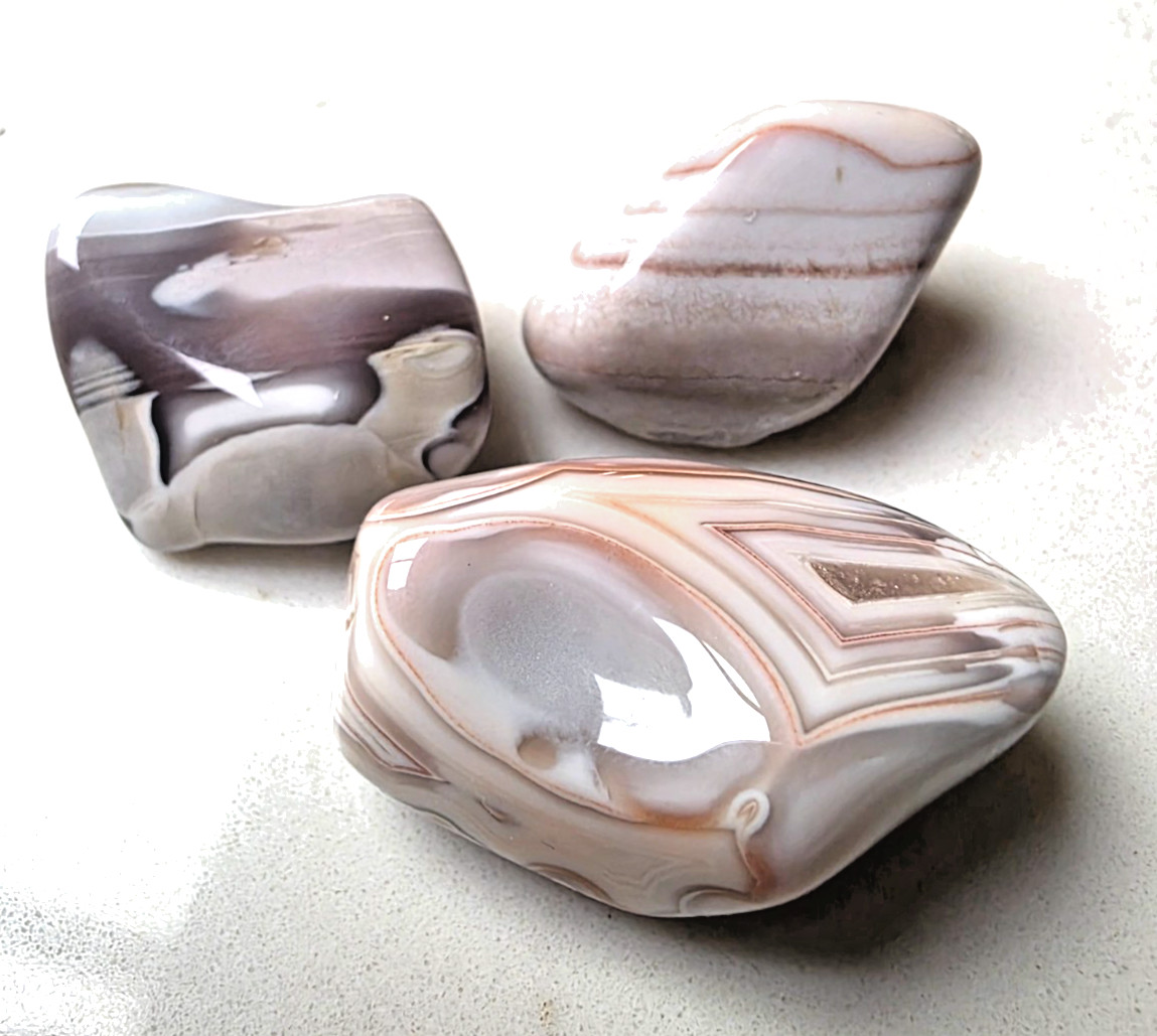 3 POLISHED BOTSWANA AGATEs , Bands , eyes , Pinks . Nice Lot 42.7 grams
