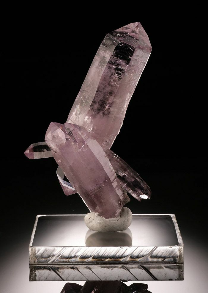 A 2-5/8″ double terminated amethyst Vera Cruz crystal with several intersecting