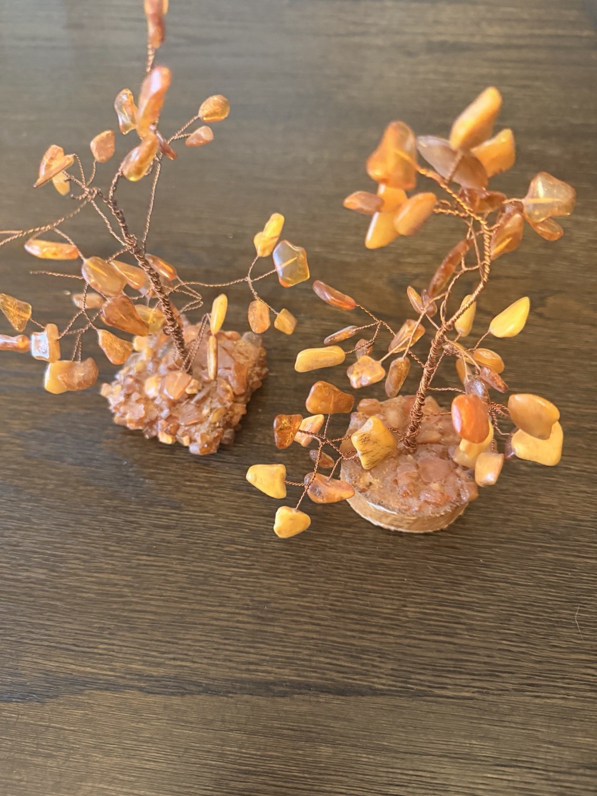 2 natural Baltic amber wire trees on wood bases. Set of two