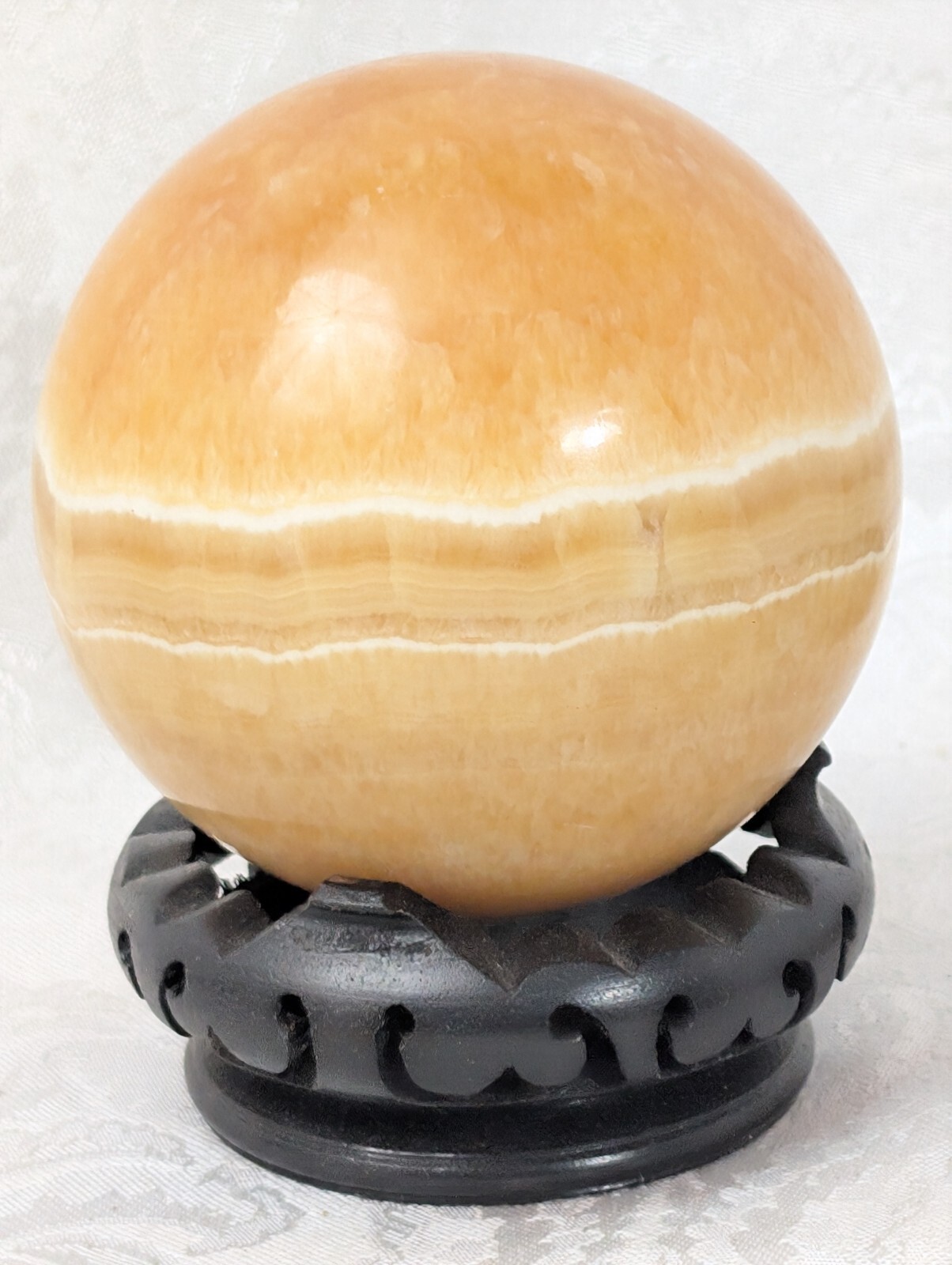 Orange Banded Calcite Sphere 700 Grams 76mm