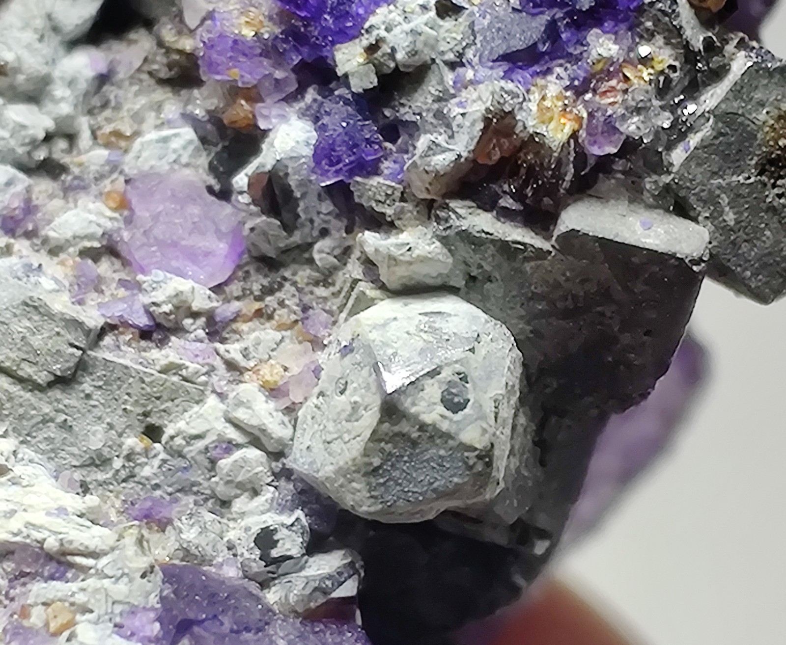 Fluorite on Galena, Sphalerite, Quartz crystals. Illinois. 25 grams.
