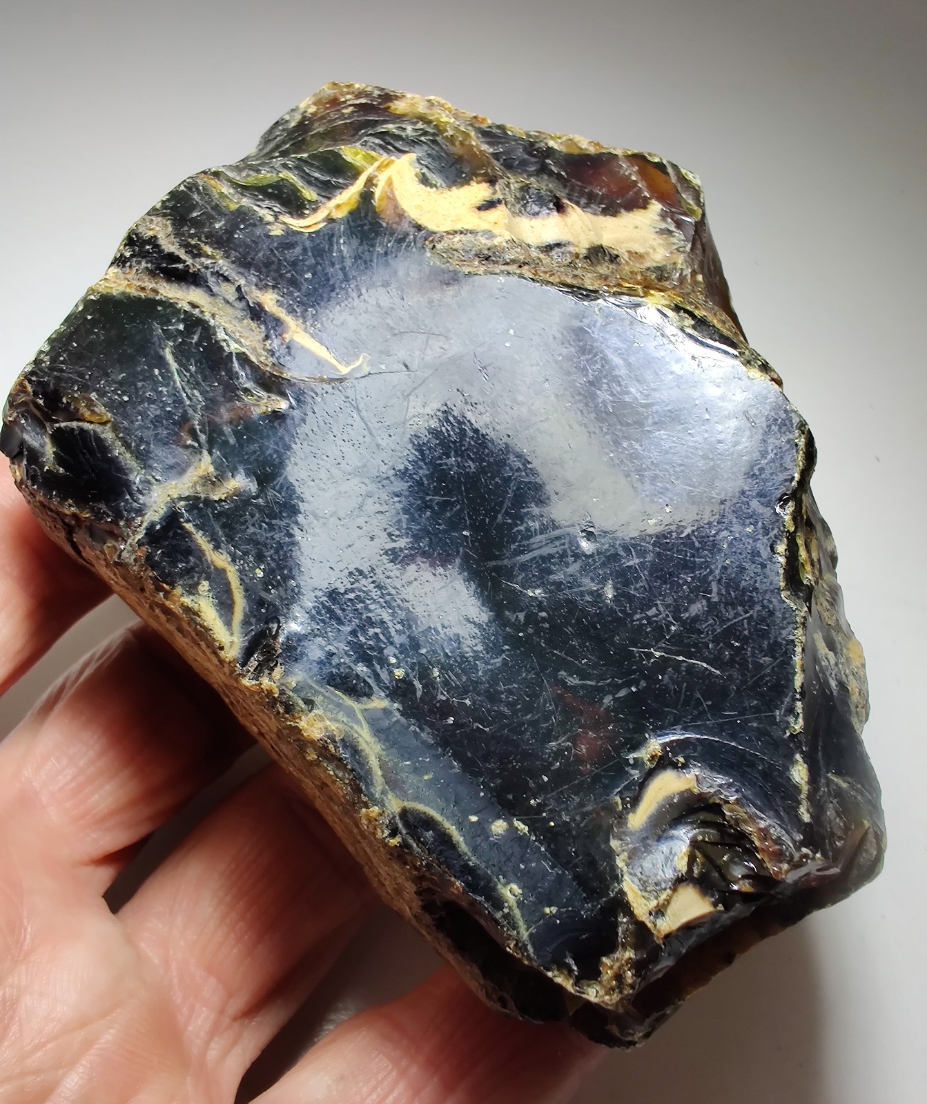 Amber, fluoresces blue. From Sumatra, Indonesia. 188 grams.