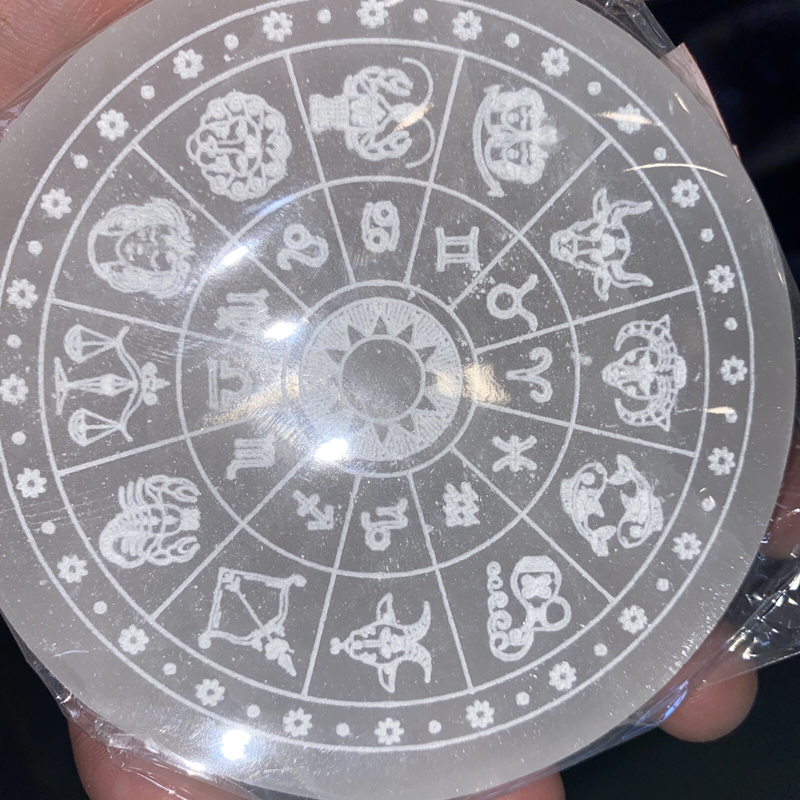 Selenite charging plate with zodiac symbols