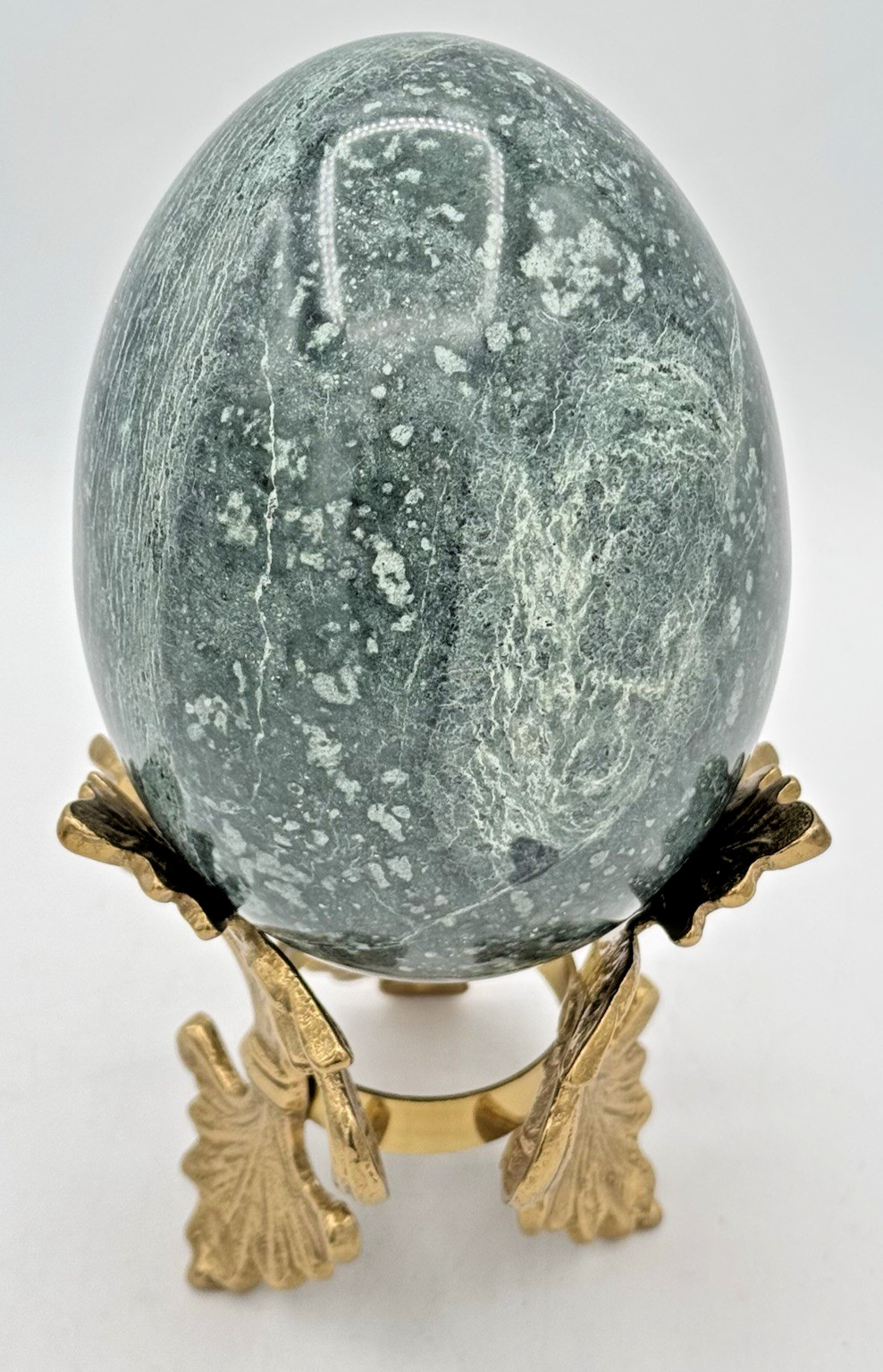 The Connoisseur Collection Teal Green Marble Egg On A Brass Fleur De Lis Base