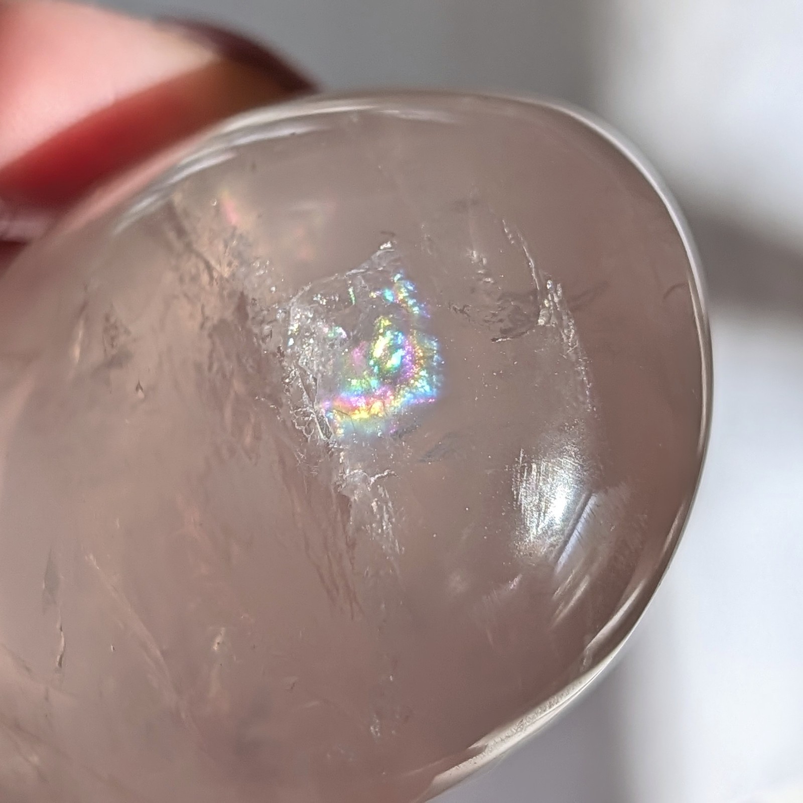 2″ translucent rose quartz palmstone with rainbow and asterism, star rose quartz