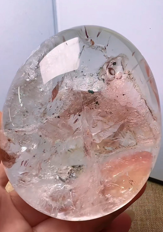 87*71*34mm Natural Enhydro Quartz Moving Water Drop Specimens Palm Reiki
