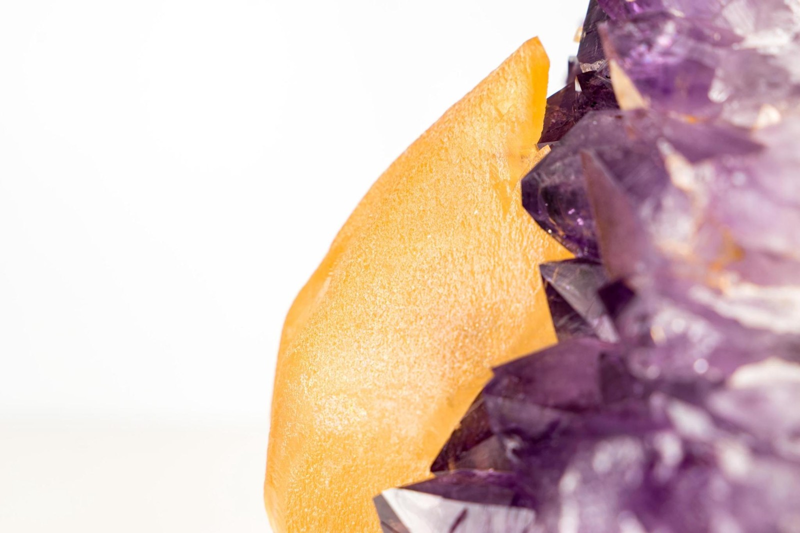 Rare Golden Yellow Calcite Specimen on Deep Purple Amethyst Cluster