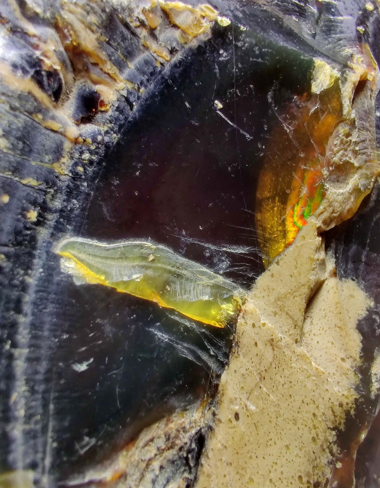Amber, fluoresces blue. From Sumatra, Indonesia. 188 grams.