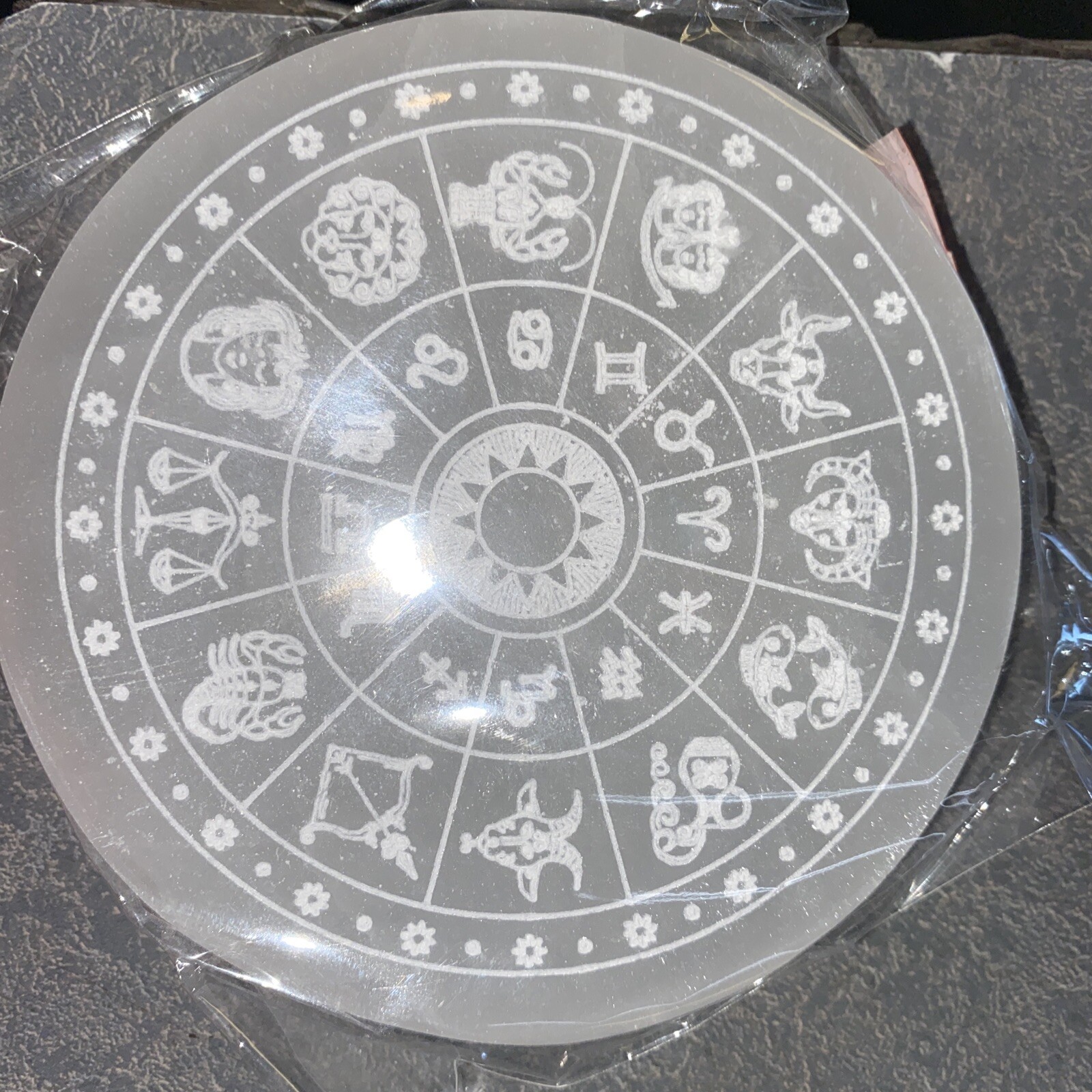 Selenite charging plate with zodiac symbols