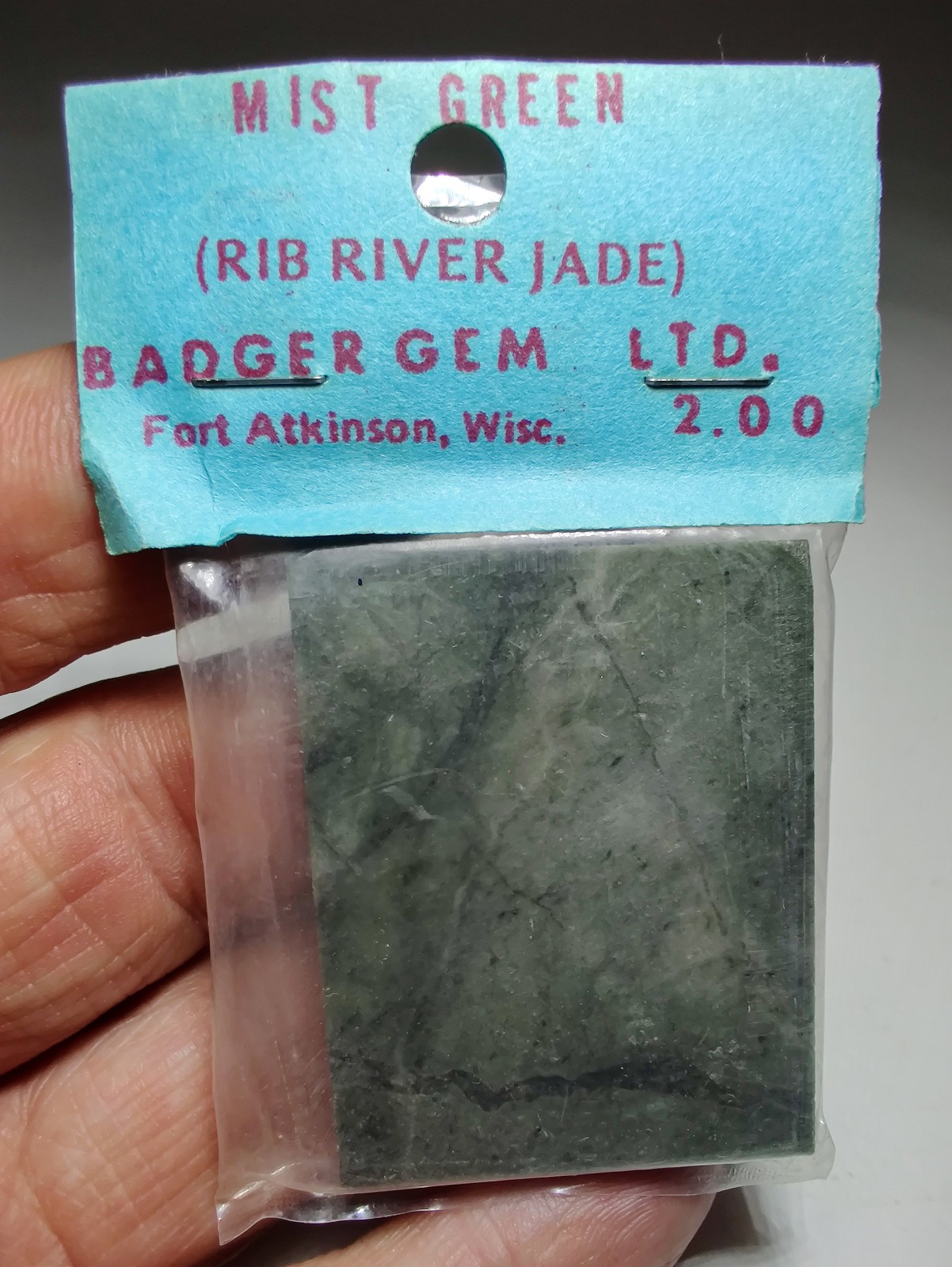 Nephrite Jade slab in sealed old pkg. Marathon County, Wisconsin. 28 grams.