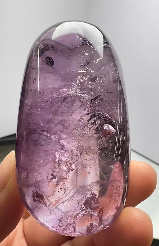 67*36*30mm Natural Amethyst Quartz Moving Water Drop Specimens Palm Reiki