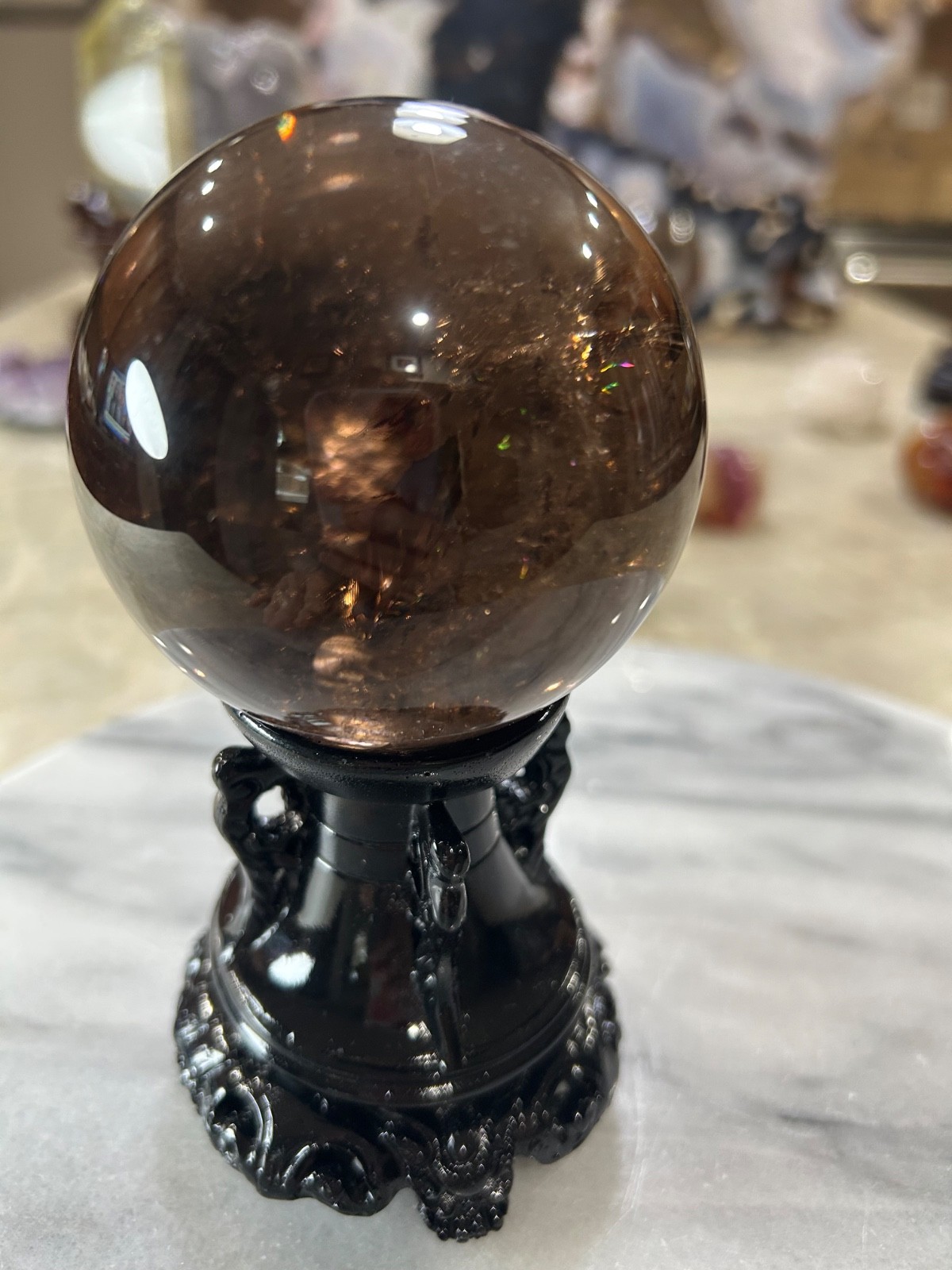 Smoky quartz sphere on resin stand 2.72”