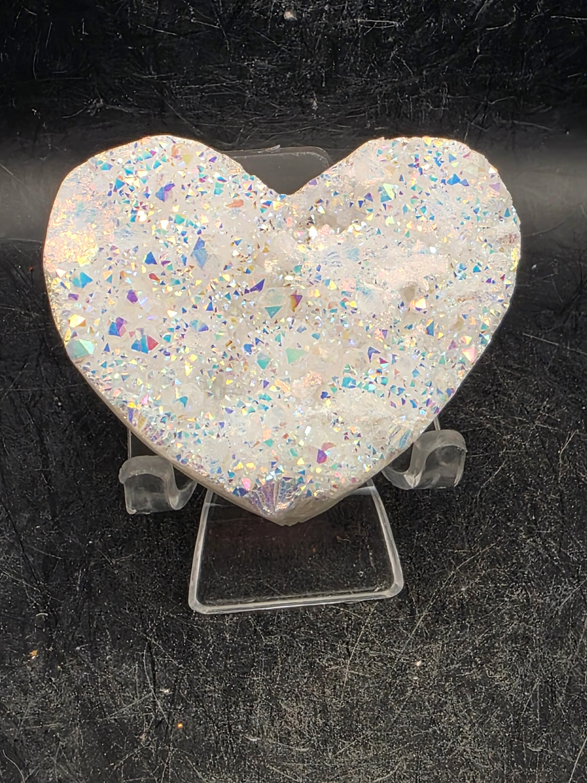 White pearl aura quartz heart! 3.4 ounces, 2.5 inches wide, 2.1″ tall