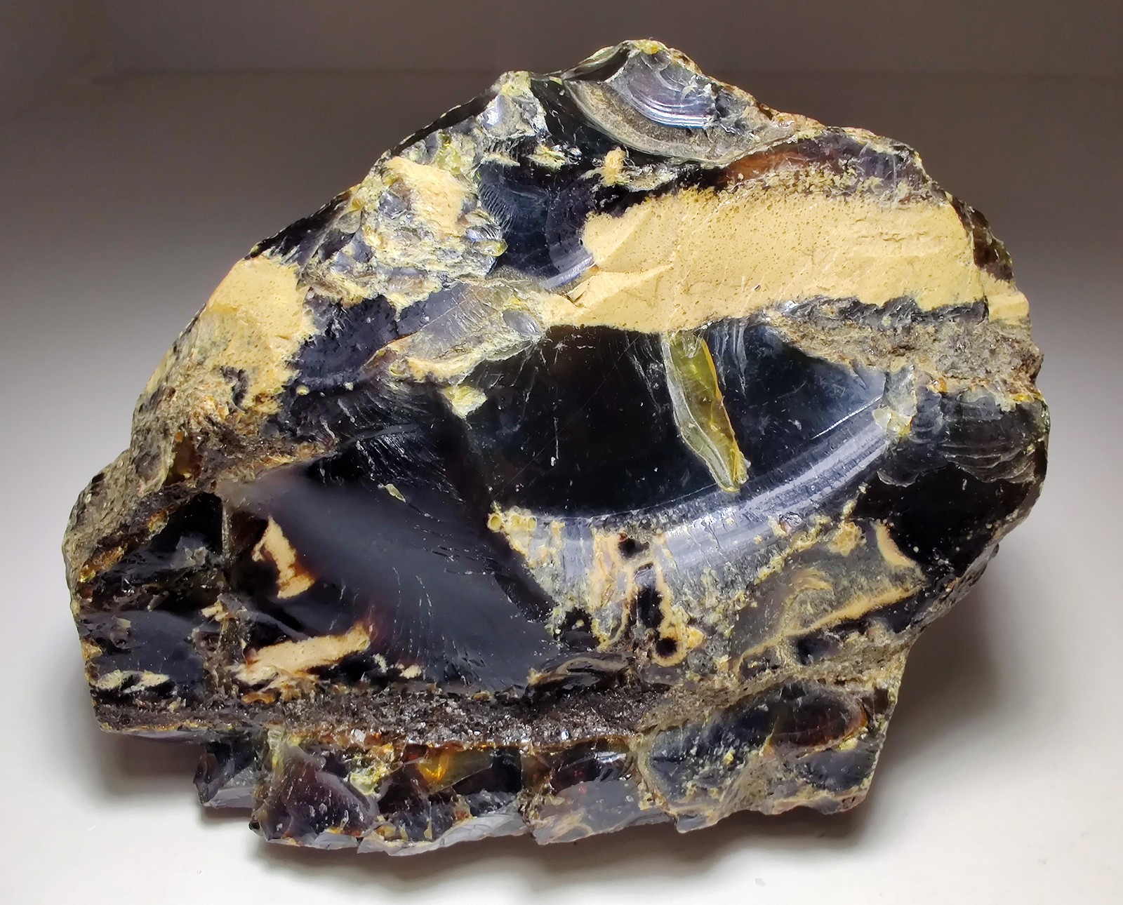 Amber, fluoresces blue. From Sumatra, Indonesia. 188 grams.