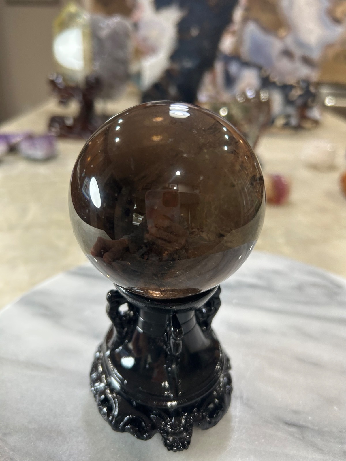 Smoky quartz sphere on resin stand 2.72”