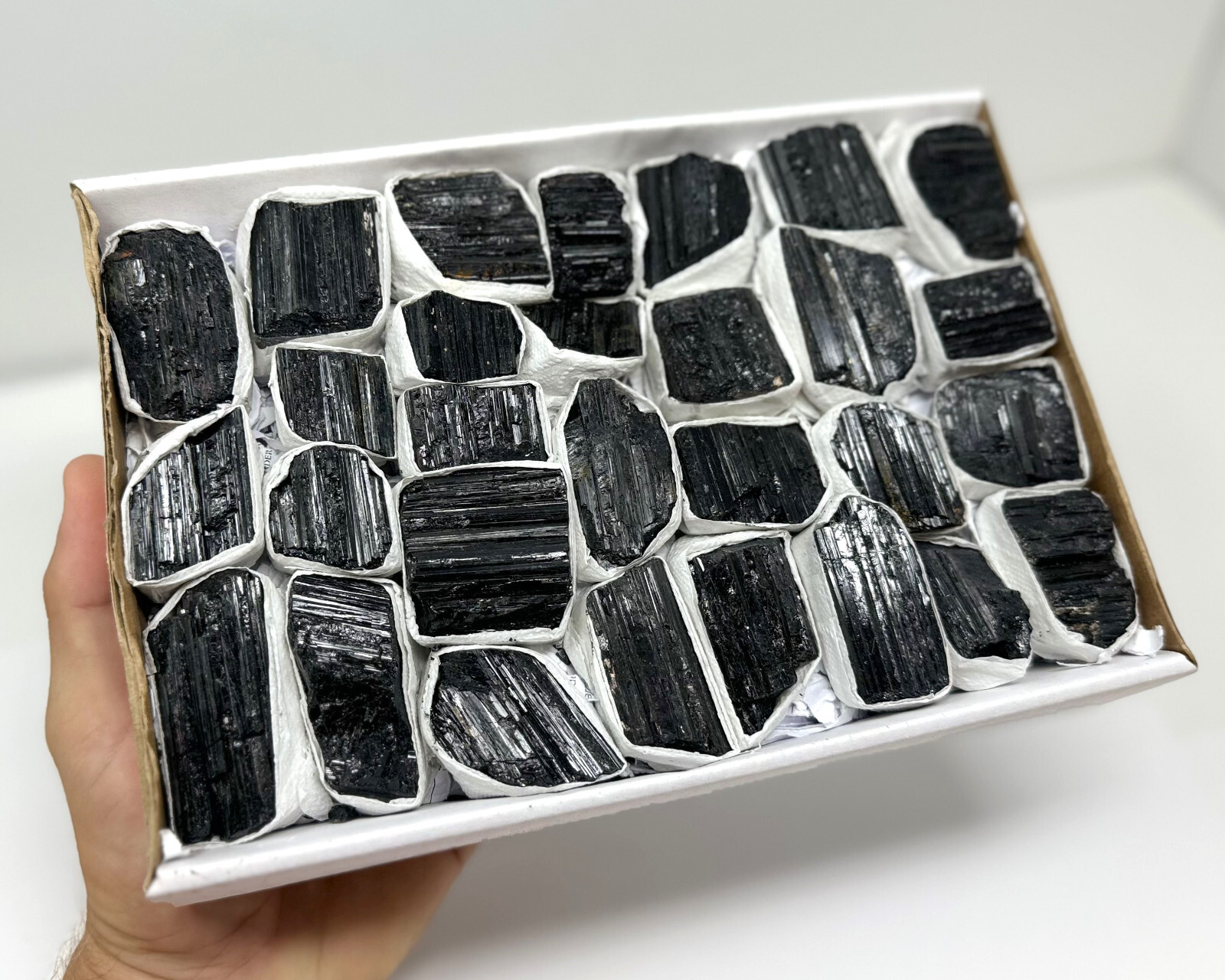 Natural Rough Black Tourmaline Log Box 22 – 28 Pcs (Raw Tourmaline Crystals)