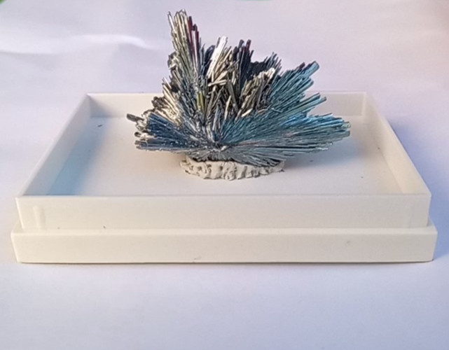 Stibnite bright mineral crystal cluster specimen black reflective fan shape