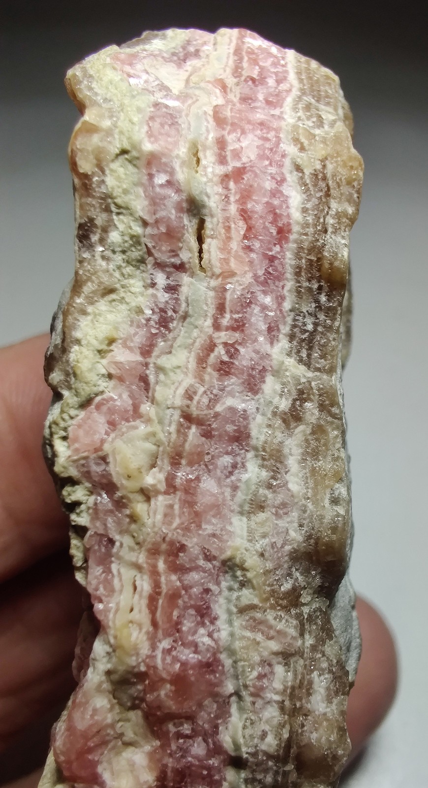 Rhodochrosite with crystals and banding. Capillitas, Argentina. 185 grams.