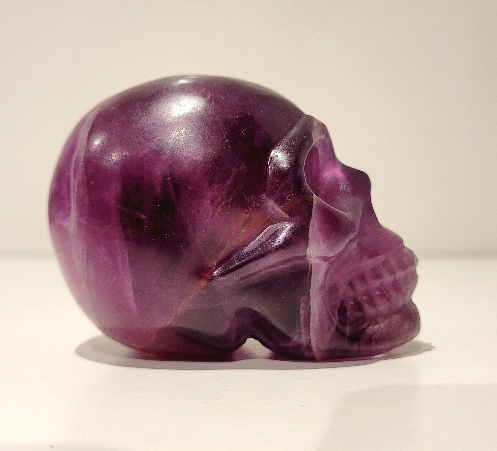 Purple Flourite Human Skull Carving Natural Crystal UV Reactive 439.8g, 0.9lbs