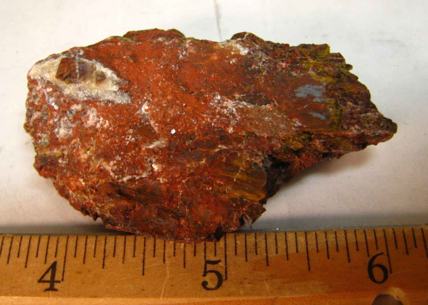 49g 2.4×1.6x.7inch RED PIETERSITE ROUGH W/YELLOW NAMIBIA #186