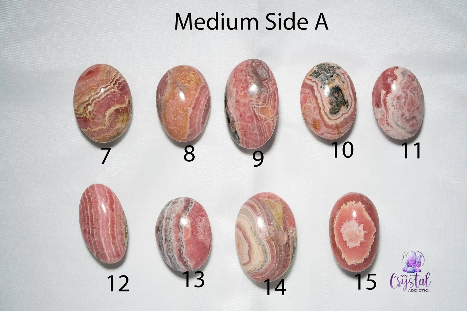 Rhodochrosite Palm Stone – Puffy